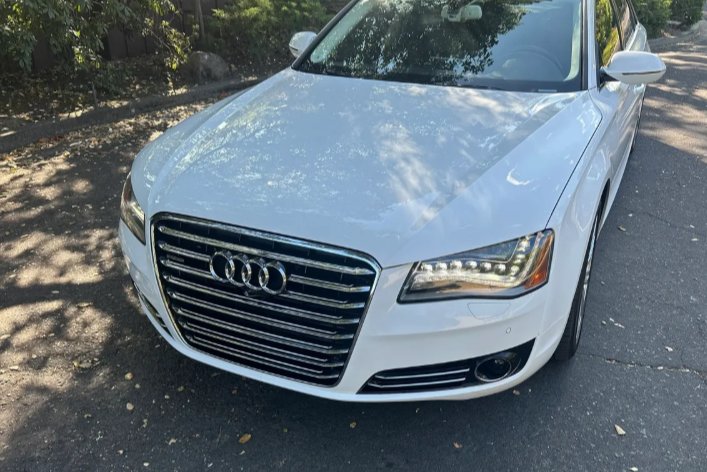 Glossy Audi front after Deluxe wash